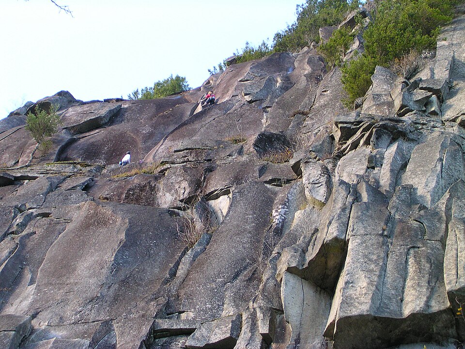 Rock climbers on the "Index Town Wall", a set of granite cliffs in Index, Washin